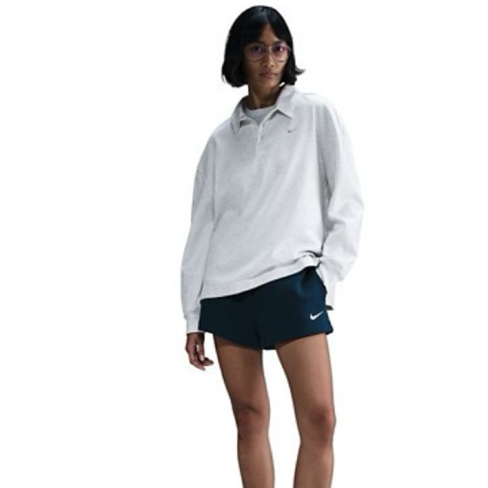 Nike Women's Navy Blue Athletic Shorts with White Swoosh